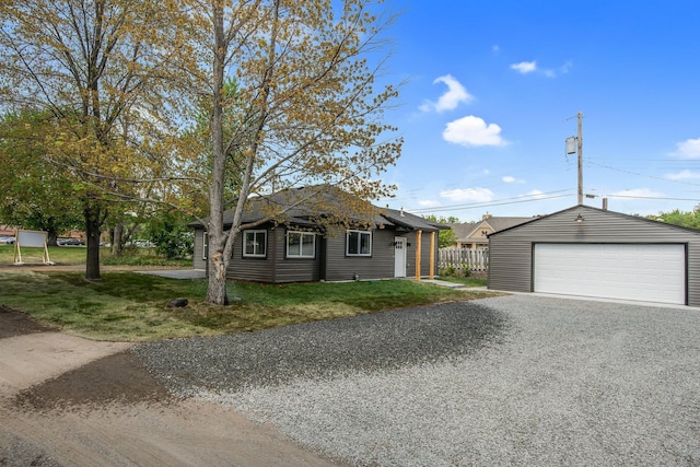 309 Shore Dr, Forest Lake, MN 55025 - view of front facade with a detached garage and an outdoor structure