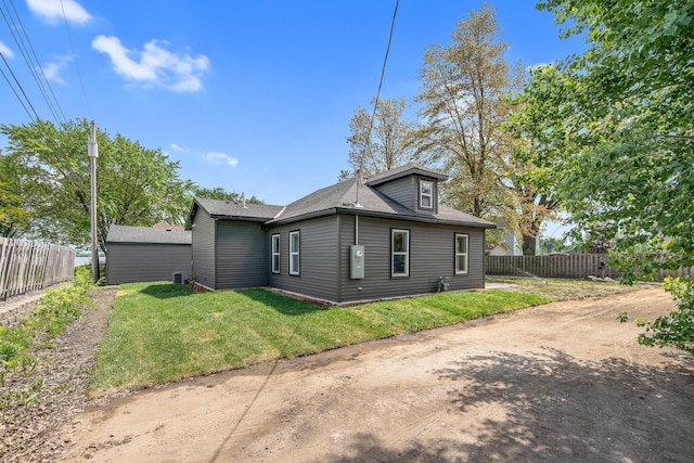 309 Shore Dr, Forest Lake, MN 55025 - view of front facade with cooling unit and a shingled roof