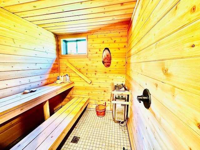 30710 County Road 45, Marcell Twp, MN 56628 - sauna with wood walls, wood ceiling, and tile patterned flooring