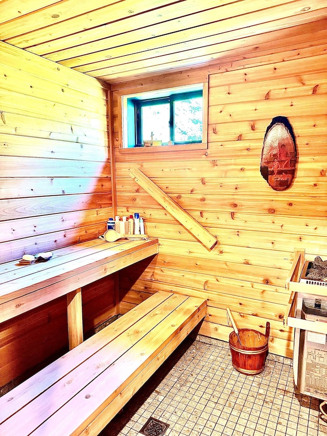 30710 County Road 45, Marcell Twp, MN 56628 - relaxing sauna / steam room with wood walls, tile patterned floors, and wood ceiling