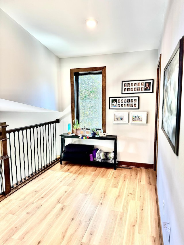 30710 County Road 45, Marcell Twp, MN 56628 - hallway featuring wood finished floors and baseboards