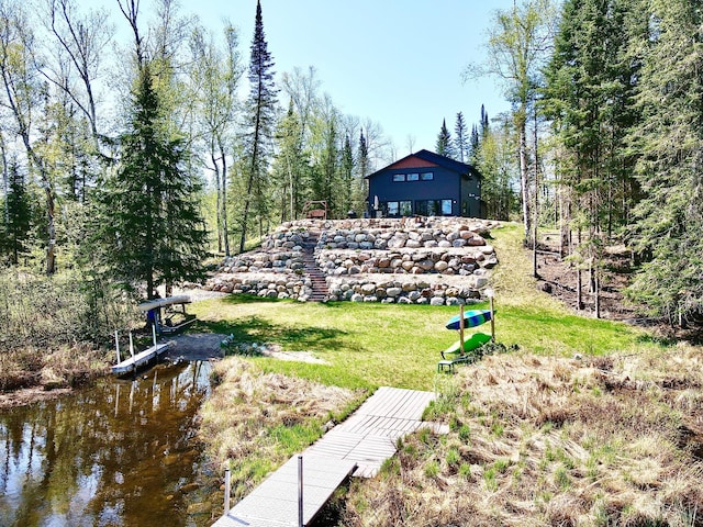30710 County Road 45, Marcell Twp, MN 56628 - rear view of property with a yard and a water view