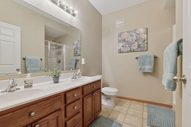 13900 Garnet Ter NW, Ramsey, MN 55303 - bathroom with a stall shower, double vanity, and tile patterned floors