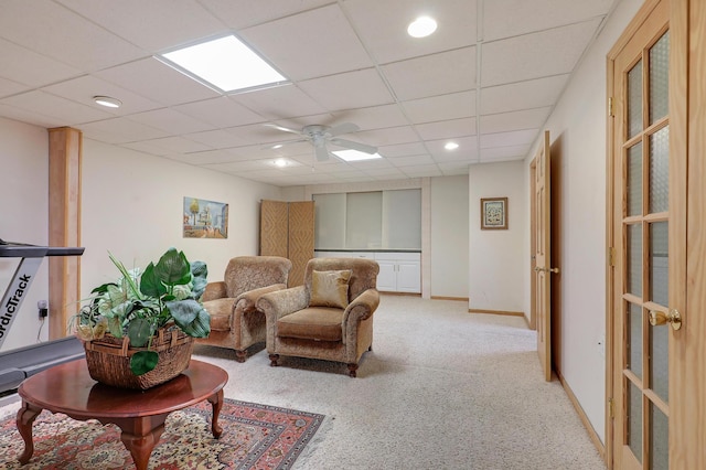 8207 Norman Creek Trl, Bloomington, MN 55437 - living area with light carpet, ceiling fan, recessed lighting, baseboards, and a paneled ceiling