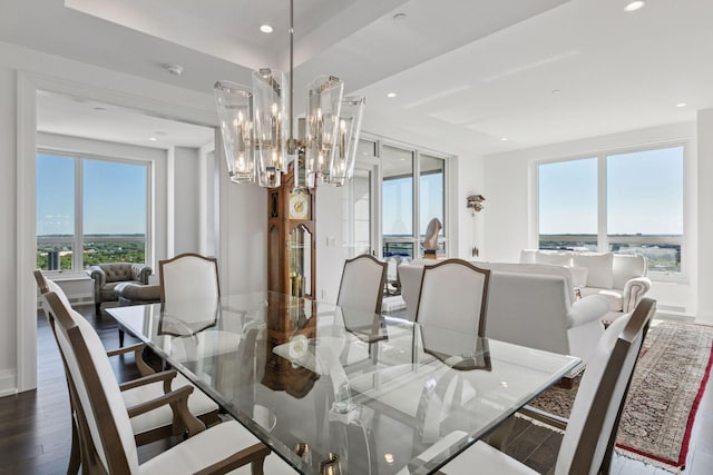 1111 River Pkwy Unit 24C, Minneapolis, MN 55415 - dining area featuring healthy amount of natural light, dark wood-type flooring, a chandelier, and recessed lighting