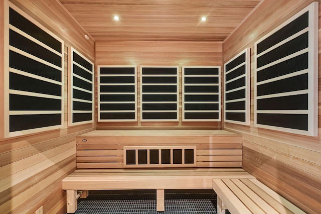1111 River Pkwy Unit 24C, Minneapolis, MN 55415 - sauna / steam room with wooden ceiling, wood walls, and recessed lighting