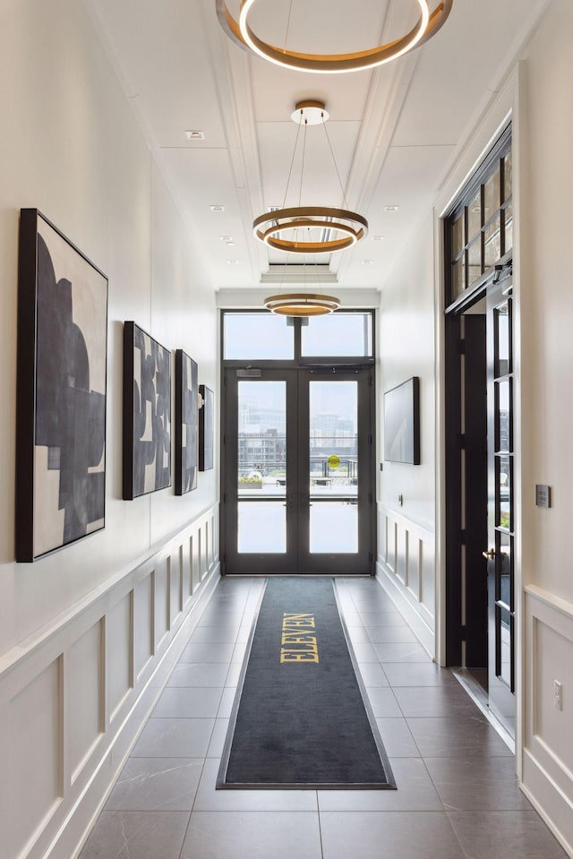 1111 River Pkwy Unit 24C, Minneapolis, MN 55415 - corridor with tile patterned flooring, french doors, and coffered ceiling