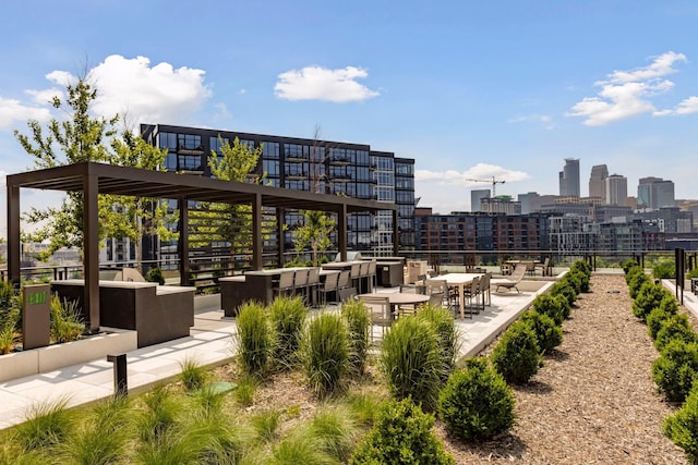 1111 River Pkwy Unit 24C, Minneapolis, MN 55415 - view of property's community featuring a skyline view and a patio