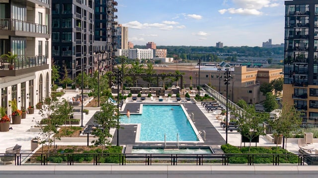 1111 River Pkwy Unit 24C, Minneapolis, MN 55415 - view of swimming pool with a city view