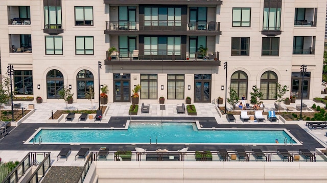 1111 River Pkwy Unit 24C, Minneapolis, MN 55415 - community pool with a patio area and french doors