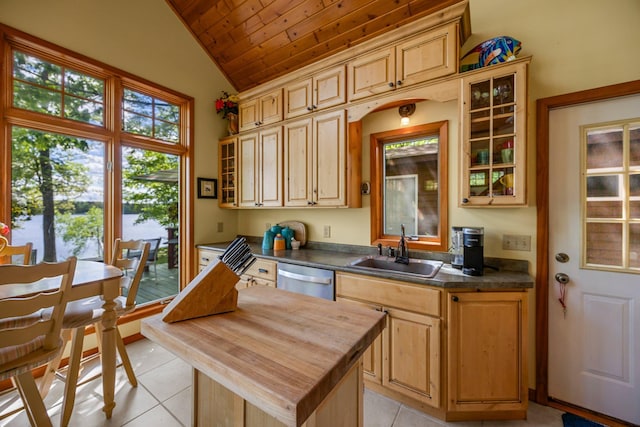 209 9 1/2 Ave, Turtle Lake, WI 54889 - kitchen with a sink, dishwasher, lofted ceiling, light tile patterned floors, and wooden ceiling