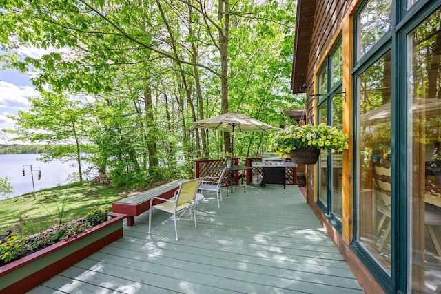 209 9 1/2 Ave, Turtle Lake, WI 54889 - wooden deck with a water view and outdoor dining area