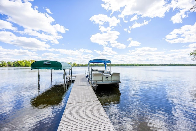 209 9 1/2 Ave, Turtle Lake, WI 54889 - dock area featuring boat lift and a water view