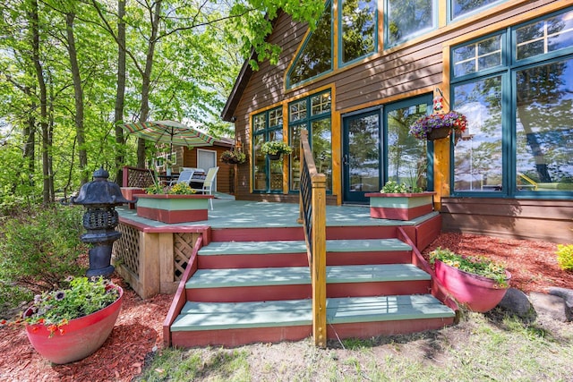 209 9 1/2 Ave, Turtle Lake, WI 54889 - doorway to property featuring a deck