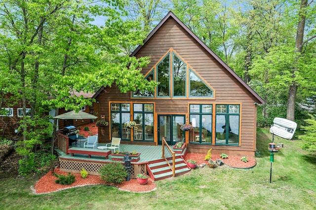 209 9 1/2 Ave, Turtle Lake, WI 54889 - rear view of property with a deck and a lawn