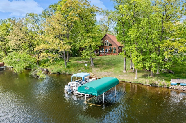 209 9 1/2 Ave, Turtle Lake, WI 54889 - dock area with a lawn, boat lift, view of scattered trees, and a deck with water view