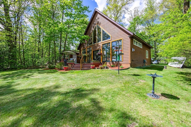 209 9 1/2 Ave, Turtle Lake, WI 54889 - view of front of house with a deck and a front lawn