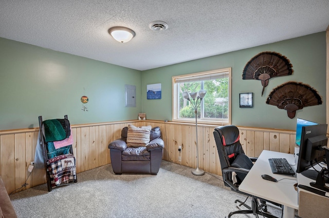 604 Brookview Ln SW, Isanti, MN 55040 - home office featuring a wainscoted wall, carpet flooring, wood walls, electric panel, and a textured ceiling
