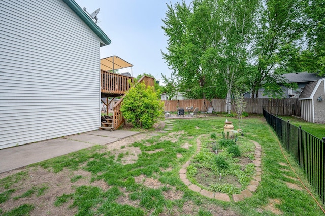 604 Brookview Ln SW, Isanti, MN 55040 - view of yard with a wooden deck and a patio area