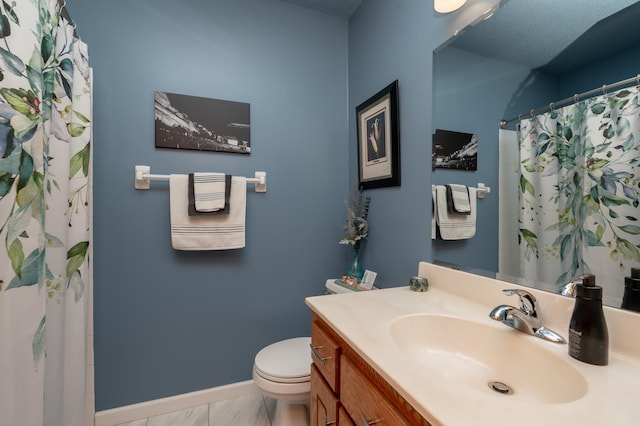 full bath featuring baseboards, marble finish flooring, toilet, vanity, and curtained shower
