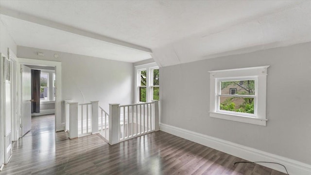 1001 Washington Memorial Dr, Saint Cloud, MN 56301 - empty room featuring healthy amount of natural light, wood finished floors, and baseboards