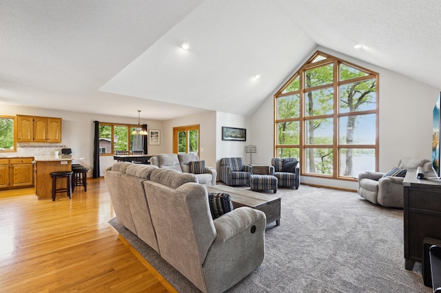 25306 Csah 4, Dassel Twp, MN 55325 - living room with light wood-style flooring, vaulted ceiling, and recessed lighting