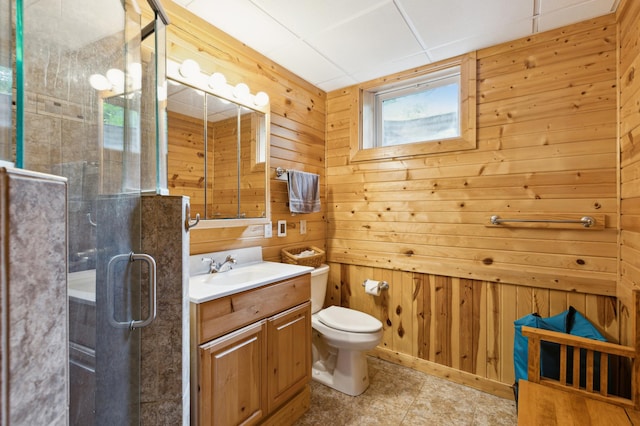 25306 Csah 4, Dassel Twp, MN 55325 - full bathroom featuring vanity, wooden walls, toilet, a shower stall, and tile patterned floors