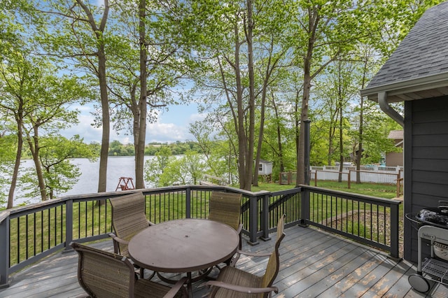 25306 Csah 4, Dassel Twp, MN 55325 - wooden terrace with a water view and outdoor dining space