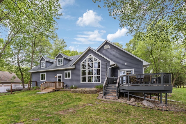 25306 Csah 4, Dassel Twp, MN 55325 - back of property with a yard, a deck, and roof with shingles