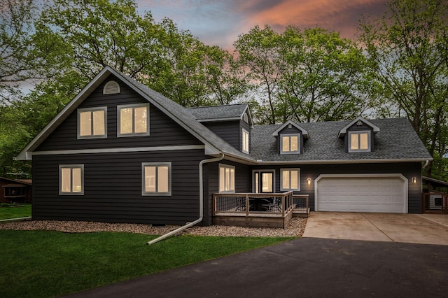 25306 Csah 4, Dassel Twp, MN 55325 - view of front facade with concrete driveway, a garage, roof with shingles, and a yard