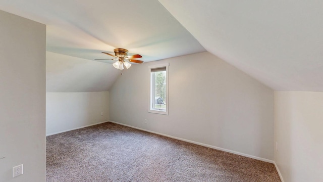 368 Main St, Zumbrota, MN 55992 - additional living space featuring carpet flooring, vaulted ceiling, baseboards, and a ceiling fan