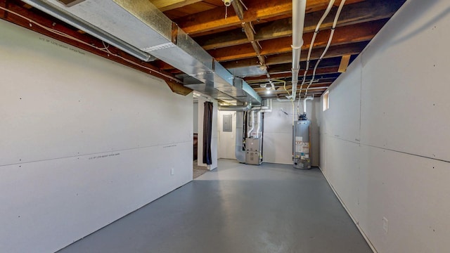 368 Main St, Zumbrota, MN 55992 - unfinished basement with gas water heater, heating unit, and electric panel
