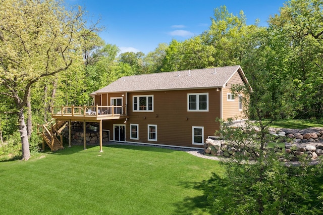 8259 Barton Ave NW, Buffalo, MN 55313 - back of property featuring stairs, a wooden deck, a yard, and roof with shingles