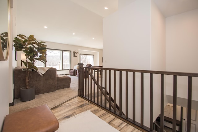 8259 Barton Ave NW, Buffalo, MN 55313 - hall with wood finished floors, an upstairs landing, and recessed lighting