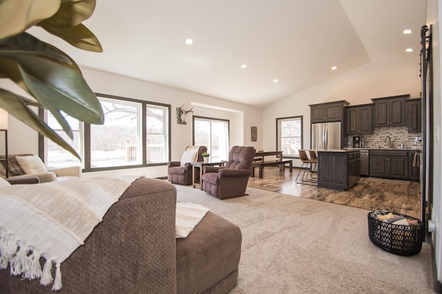 8259 Barton Ave NW, Buffalo, MN 55313 - bedroom featuring freestanding refrigerator, recessed lighting, and vaulted ceiling