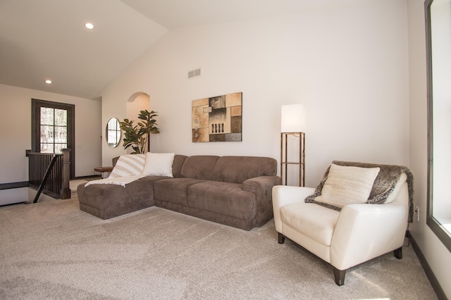 8259 Barton Ave NW, Buffalo, MN 55313 - living area featuring carpet flooring, recessed lighting, and high vaulted ceiling