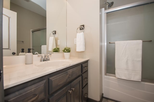 8259 Barton Ave NW, Buffalo, MN 55313 - full bath featuring vanity and shower / bath combination with glass door