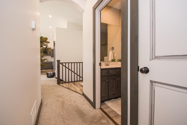 8259 Barton Ave NW, Buffalo, MN 55313 - hall featuring an upstairs landing and light carpet