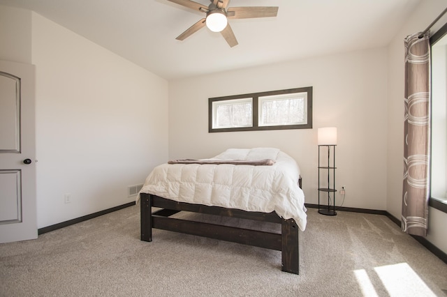 8259 Barton Ave NW, Buffalo, MN 55313 - bedroom featuring light carpet and a ceiling fan