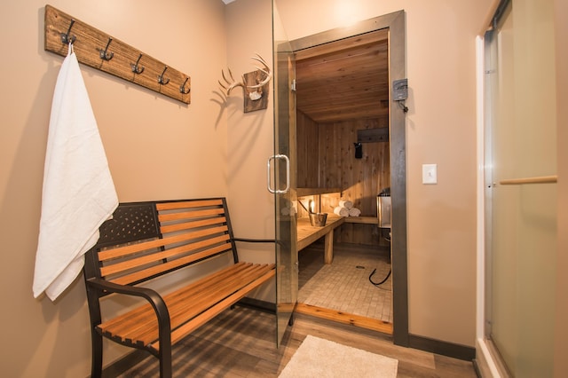 8259 Barton Ave NW, Buffalo, MN 55313 - corridor featuring wood finished floors and a sauna