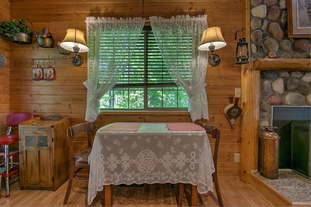 6000 152nd St, Milaca, MN 56353 - dining space featuring wood finished floors and wooden walls