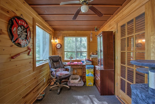 6000 152nd St, Milaca, MN 56353 - office area with wooden walls, carpet flooring, ceiling fan, and vaulted ceiling