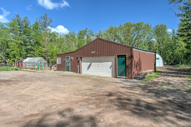 6000 152nd St, Milaca, MN 56353 - detached garage with dirt driveway