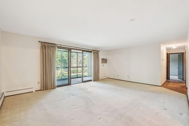 4360 Brookside Ct Unit 206, Edina, MN 55436 - carpeted spare room with a baseboard radiator and baseboards