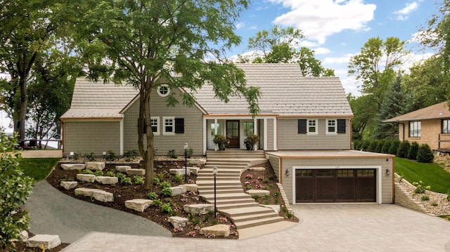 1397 Orono Ln, Orono, MN 55391 - shingle-style home with stairs, decorative driveway, and an attached garage