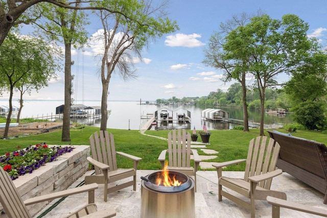 1397 Orono Ln, Orono, MN 55391 - view of patio with a fire pit, a water view, a boat dock, and boat lift