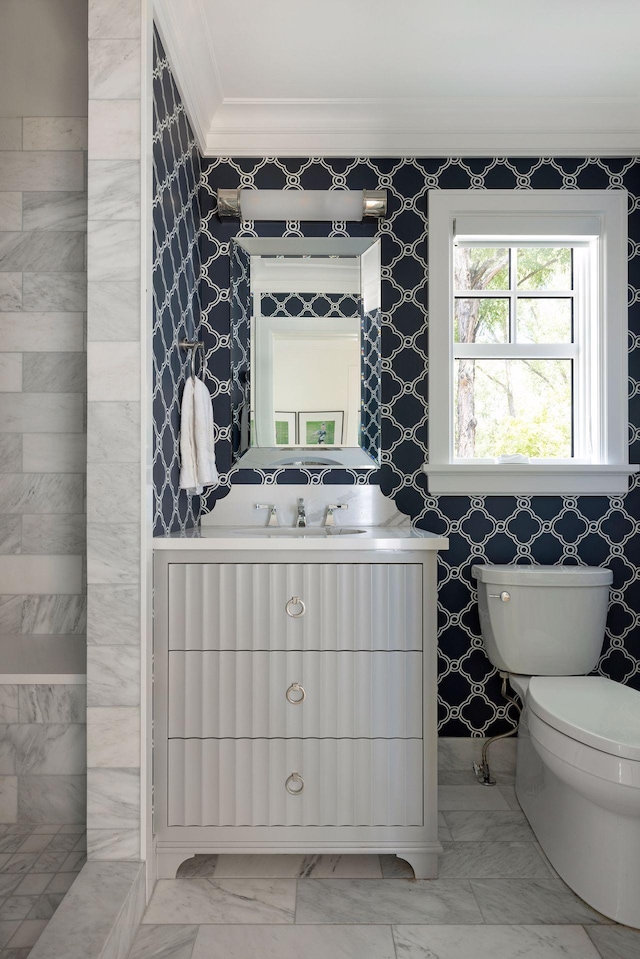 1397 Orono Ln, Orono, MN 55391 - bathroom with ornamental molding, toilet, marble finish floors, and vanity