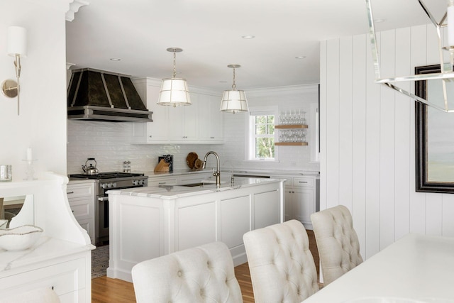 1397 Orono Ln, Orono, MN 55391 - kitchen featuring custom range hood, gas stove, a sink, and backsplash