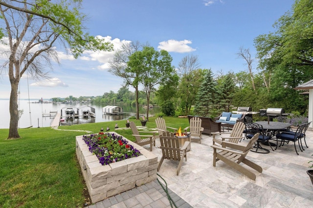 1397 Orono Ln, Orono, MN 55391 - view of patio featuring a water view, a dock, grilling area, an outdoor living space with a fire pit, and boat lift