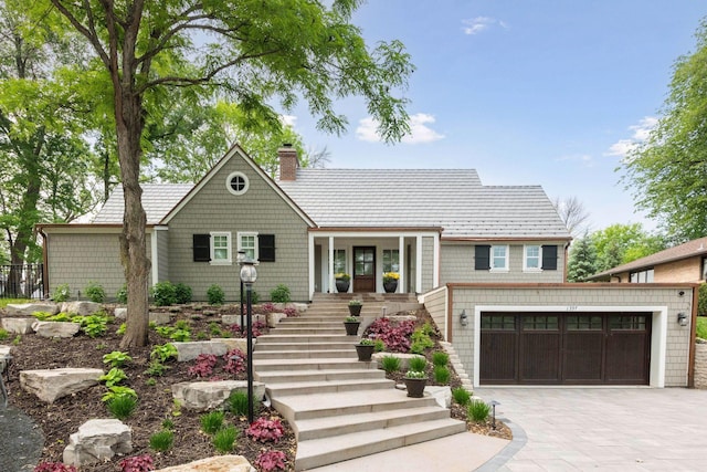 1397 Orono Ln, Orono, MN 55391 - shingle-style home with stairs, a chimney, and driveway